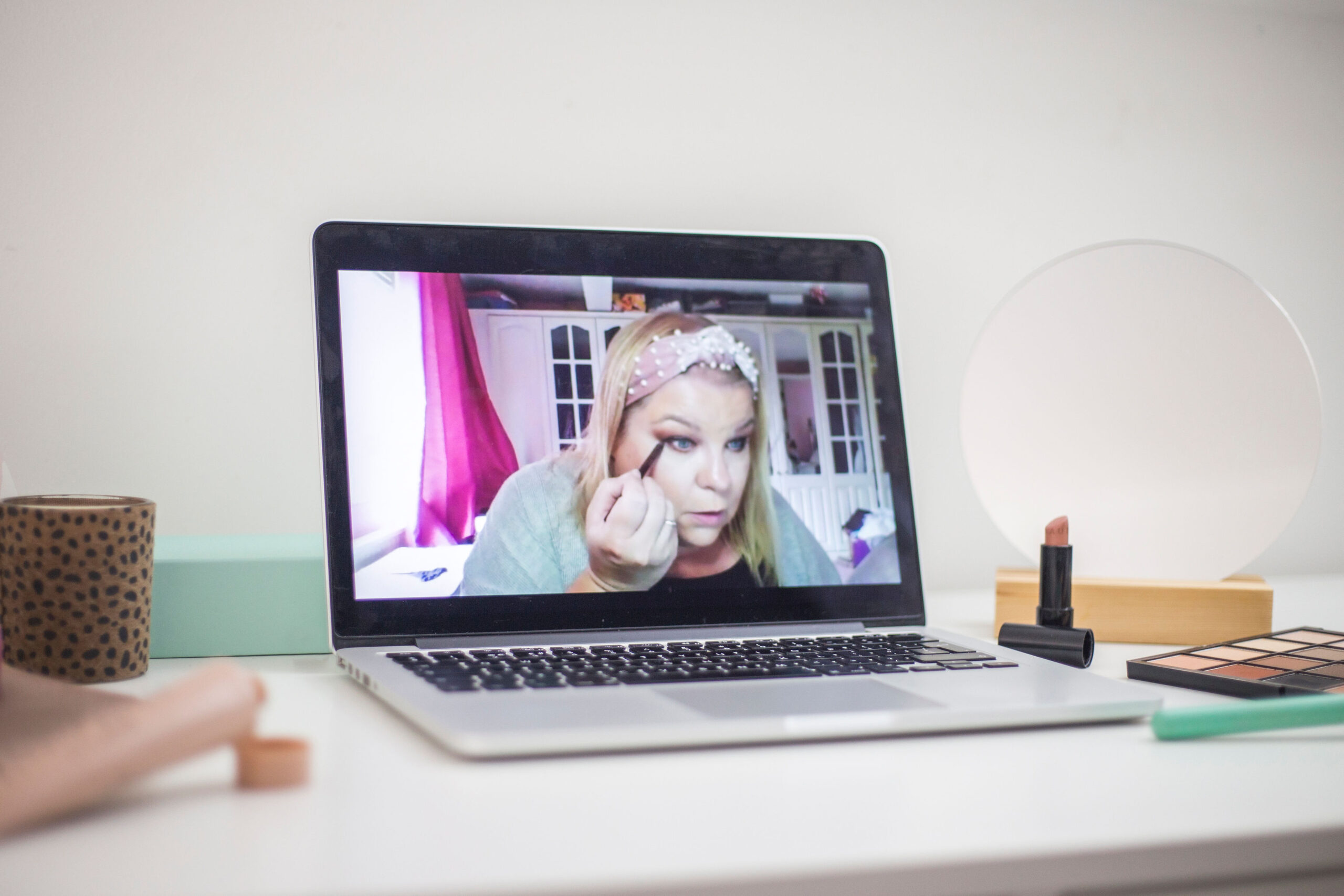 online makeup lesson via zoom on a laptop